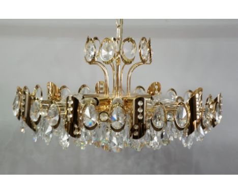 IMPRESSIVE PAIR OF MODERN GILT METAL AND CUT GLASS TEN LIGHT ELECTROLIERS, comprising of twenty straight arms with tear shape