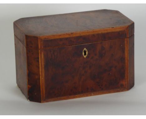 EARLY NINETEENTH CENTURY BURR YEW WOOD AND LINE INLAID TEA CADDY, of canted oblong form with two lidded compartments to the i