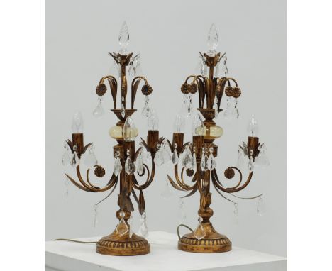 A PAIR OF GILT METAL AND GLASS THREE LIGHT TABLE LAMPS WITH THREE FOLIATE SCROLL BRANCHES. Height 66cm.