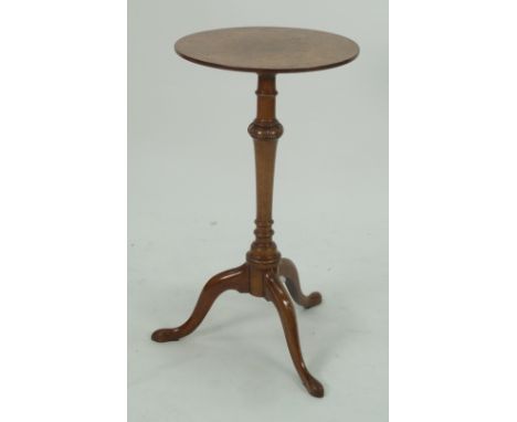 FIGURED WALNUTWOOD WINE TABLE, the circular top above a turned and carved column, raised on downswept tripod supports, 26 3/4