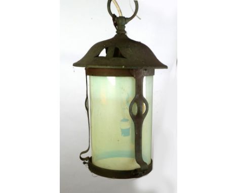 ARTS AND CRAFTS COPPER AND VASELINE GLASS HALL LANTERN, the cylindrical shaped enclosed by three pierced strapwork supports a