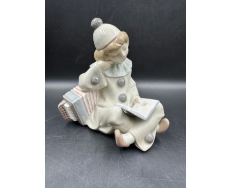 A Lladro figure of Girl with accordion Number 1178