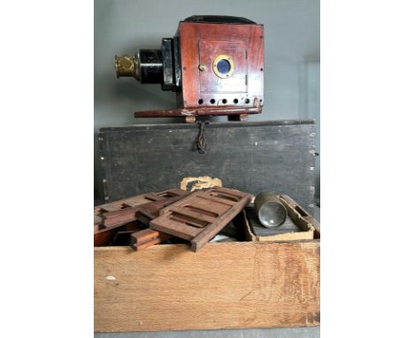 A magic lantern with over two hundred slides, various topics including Charge of The Light Brigade, Firemen and Lifeboatmen, 