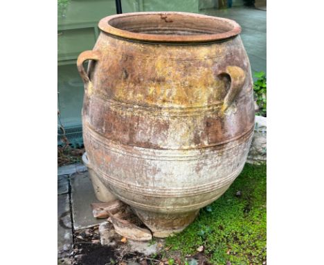 A large olive pitcher terracotta urn with three handles AF (H102cm Dia58cm)Condition Report broken at the bottom pieces are i