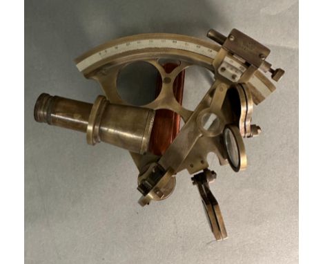 A vintage brass sextant by Kelvin and Hughs on London stamped 1917 