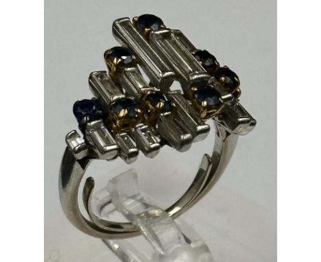 A vintage sapphire baguette cut diamond cocktail ring, diamond 1.2ct and sapphire 0.25ct, untested white metal 