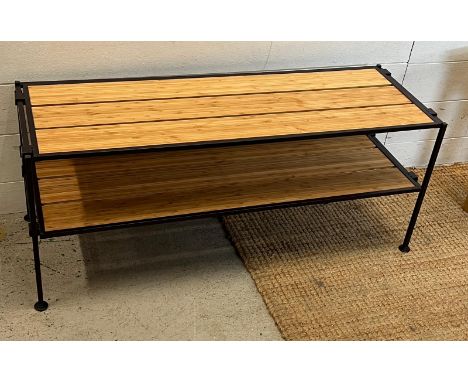 A light oak and metal frame shoe rack (H38cm W89cm D30cm)
