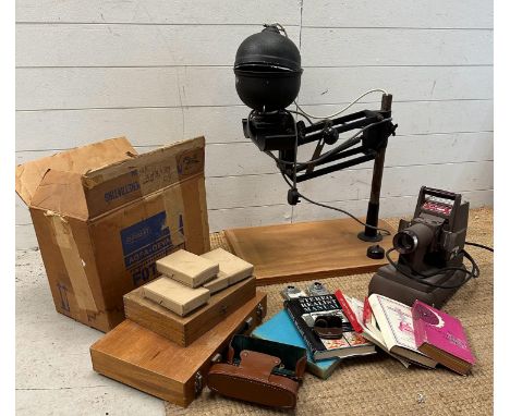 A large quantity of vintage photographic equipment and ephemera to include a Leitz enlarger, a Kershaw daylight projector, Re