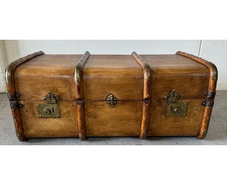 A vintage wooden banded steamer trunk with brass fittings, opening to single shelf with stripped cotton interior (84cm x 51cm