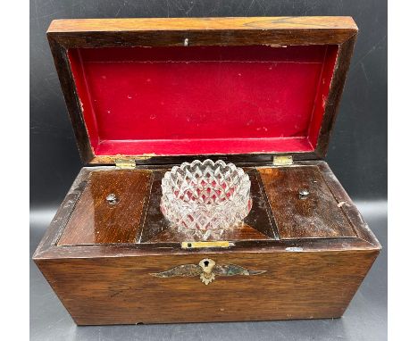 A sarcophagus shaped tea caddy with cut glass mixing bowl and mother of pearl decoration (29.5cm x 15.cm approximately.