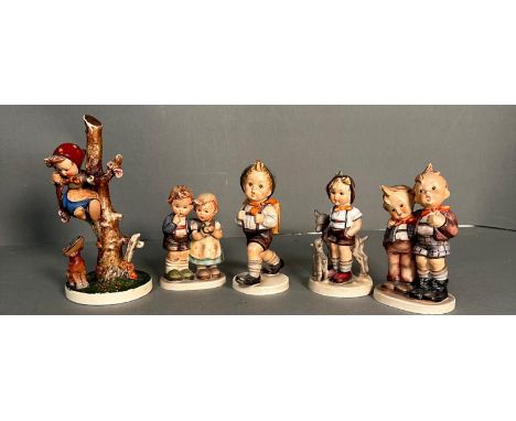 A selection of five Hummel figures