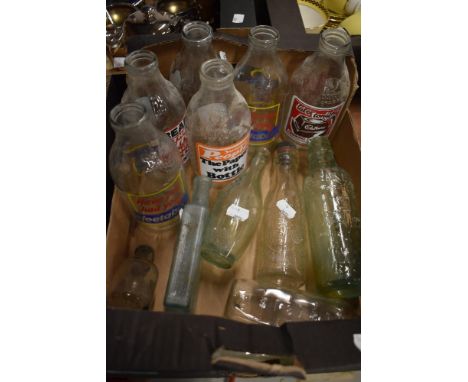 A small selection of vintage bottles and advertising milk bottles
