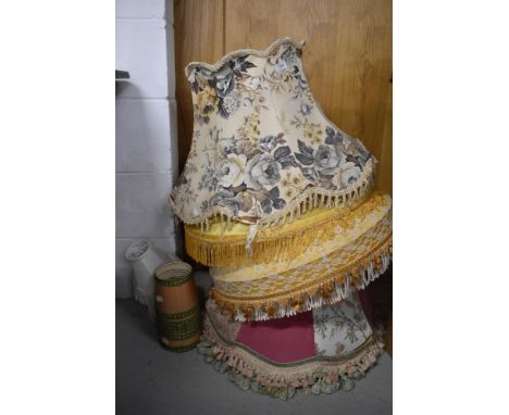 A selection of vintage lampshades including four standard and nine wall light shades.