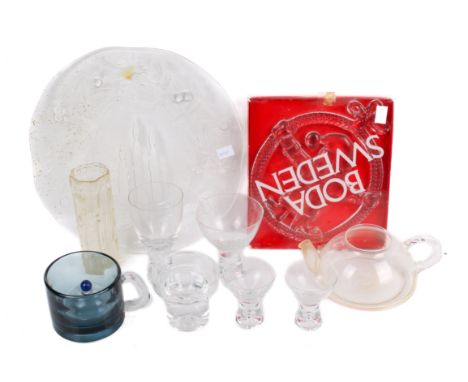 An assortment of glassware. Including a Whitefriars style vase, an embossed charger, a clear glass teapot, etc. largest H17cm