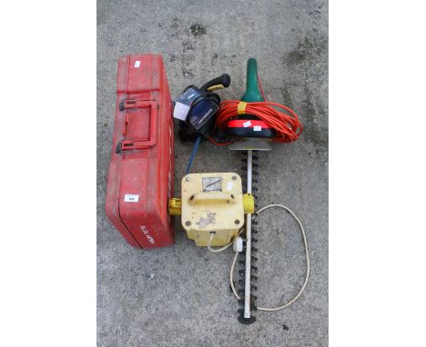 Group of assorted tools. Including a Hilti TE72 hammer drill 110v, a step down transformer and a hedge trimmer, etc.This item