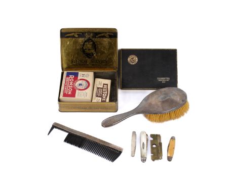 A small group of silver and collectables. Including a silver mounted brush and comb, a vintage boxed service Ronson lighter, 