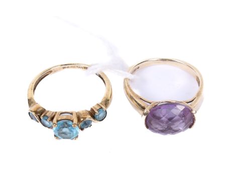 Two 9ct gold and stone rings. One set with five, possibly topaz, stones, size M, the other with an amethyst, size L/M, both h