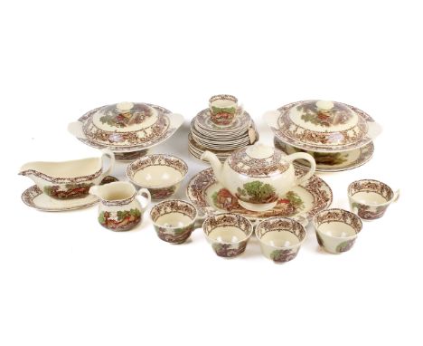 A Royal Staffordshire Pottery tea and dinner service. In the 'Rural Scenes' pattern, including two tureens, cups and saucers,