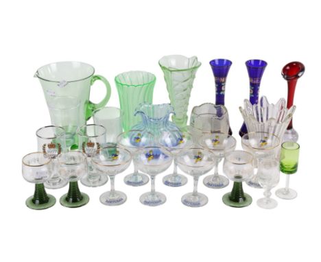 A collection of vintage glassware. Including Babycham glasses, a uranium glass jug and two vases, a pair of blue painted vase