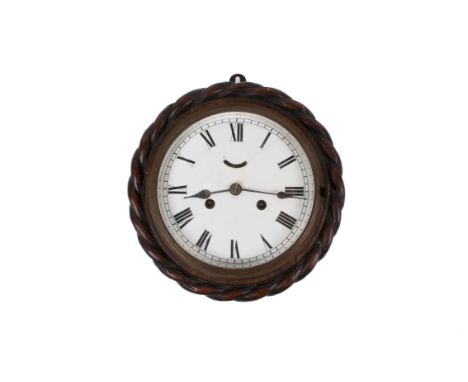 Vintage oak 'rope' carved round wall clock. White 16cm dial with Roman numerals. 