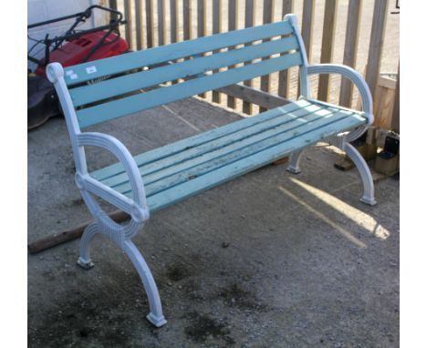 Contemporary green garden bench with wooden slats. H81cm x W130cm x D43cm