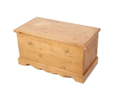 Contemporary pine blanket box trunk. Raised on a plinth. H50cm x W91cm x D48cm