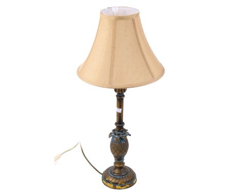 A contemporary bronze effect table lamp. With pineapple form and a circular base. H50cm