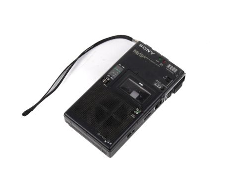 A vintage Sony FM/AM Micro Cassette-Corder, M-301. S/N 20946, requires 2x AA batteries. H16cm x W9cm x D3cm