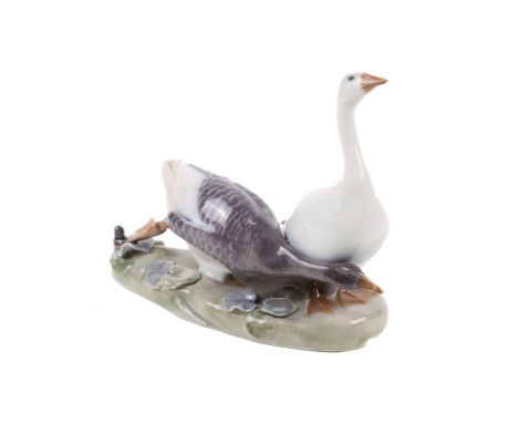 Royal Copenhagen two tethered geese group. Marks to base 'RA' #609. H15cm