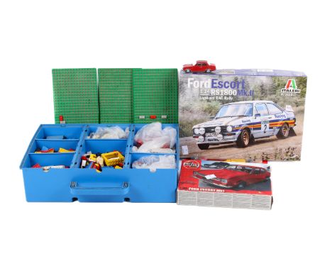 An assortment of toys. Including an Airfix 'Ford Escort MK1' kit, Lego, a Vanguard car, etc.