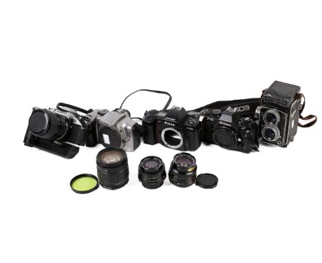 Group of assorted vintage film cameras and lenses. Including a Sunflex dual lens and a Nikon F-501, etc. Max. H14cm