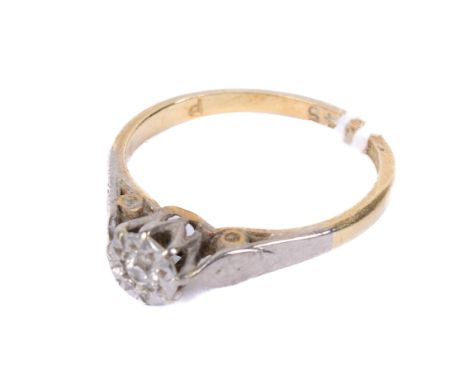 An 18ct gold and diamond ring. The illusion set diamond in platinum, the shank hallmarked, size K, weight 2.3g. 