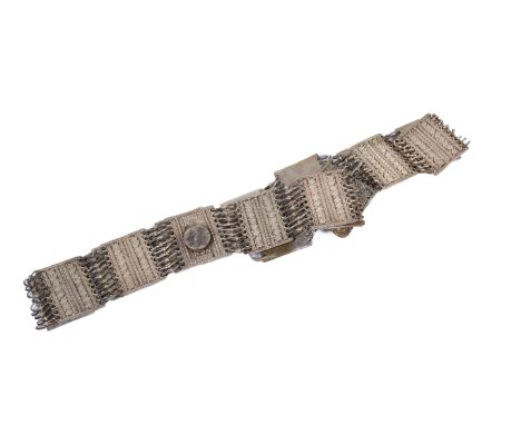 A Persian style silverplated belt. Consisting of panels with geometric patterns, each panel circa 4.7cm x 3.6cm, total length