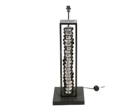 Contemporay floor lamp. The main structure painted black with chrome 'pebble' details down the central column, mounted on a r