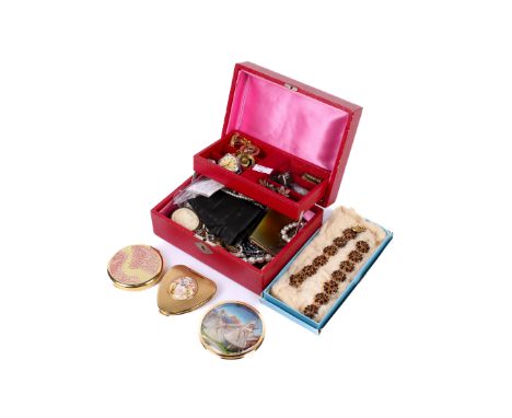 A collection of costume jewellery and powder compacts. Including stone pendants, earrings, necklaces, brooches, a vintage Smi