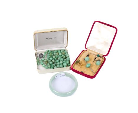 A small group of jade and other green jewellery. Including a pair of jadeite drop earrings, bar brooch, jadeite bangle, a jad