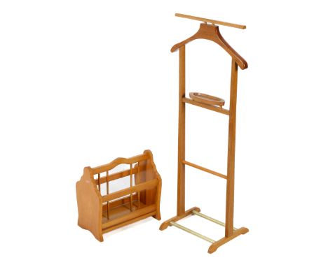A 20th century wooden valet stand and a magazine rack. The valet mounted on bracket supports united by brass stretchers, H112