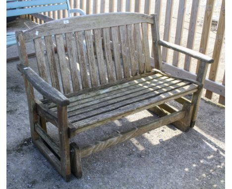 Wooden American style rocking garden bench. H83cm x W130cm x D54cm