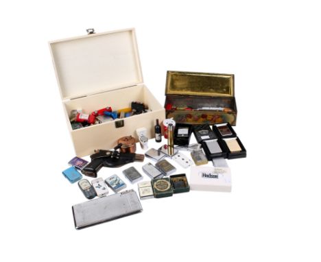 Collection of assorted vintage and modern novelty cigarette lighters. Including a Hadson juke box, Zippo, etc. 