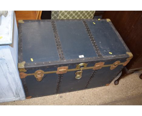 A metal bound cabin trunk 