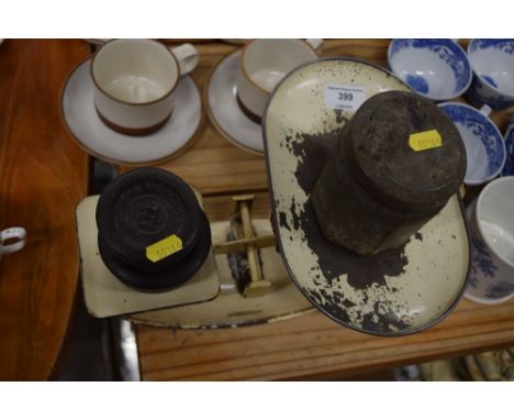 A set of kitchen scales and weights