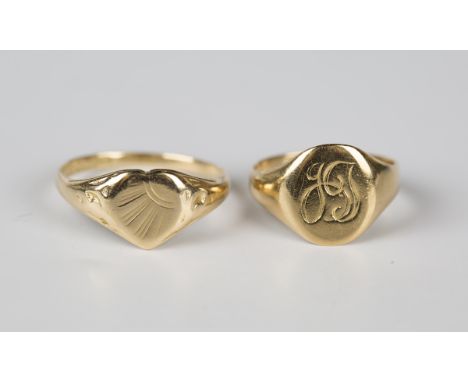 An 18ct gold heart shaped signet style ring, Birmingham 1959, ring size approx Q1/2, and a gold oval signet ring, detailed '1