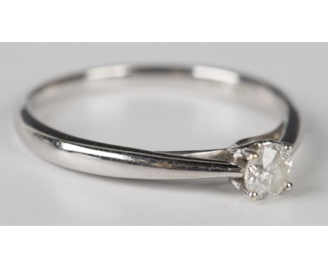 A 9ct white gold ring, claw set with a circular cut diamond, detailed '0.33 9K', weight 2.6g, ring size approx S.Buyer’s Prem