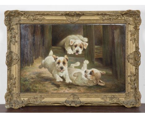 Lilian Cheviot - Three Terrier Puppies playing in a Barn, late 19th/early 20th century oil on canvas, signed recto, label ver