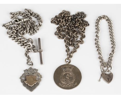 A silver graduated curblink watch Albert chain, fitted with two swivels and a fob medal, weight 81.6g, length 42cm, a silver 