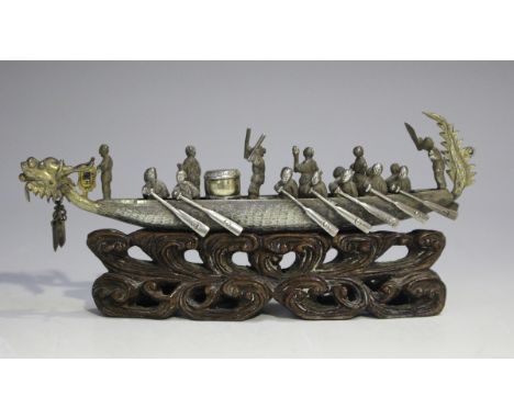 A late 19th/early 20th century Chinese silver model of a dragon boat with gilt detail, maker's mark of Hung Chong, weight 47g