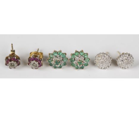 A pair of 9ct gold, emerald and diamond cluster earstuds with post fittings, diameter 1.1cm, a pair of 9ct gold, ruby and dia