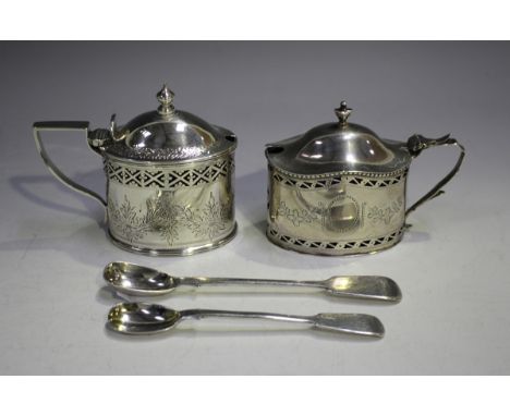 A Victorian silver oval mustard with domed hinged lid and tapered finial above a pierced lattice band and engraved foliate ga