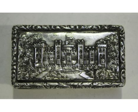 A William IV silver castle top snuff box of rectangular outline, the hinged lid decorated in relief with a scene of Windsor C