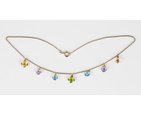 A 9ct gold, peridot, blue topaz, amethyst and citrine necklace, the oval link neckchain with seven variously shaped pendant d